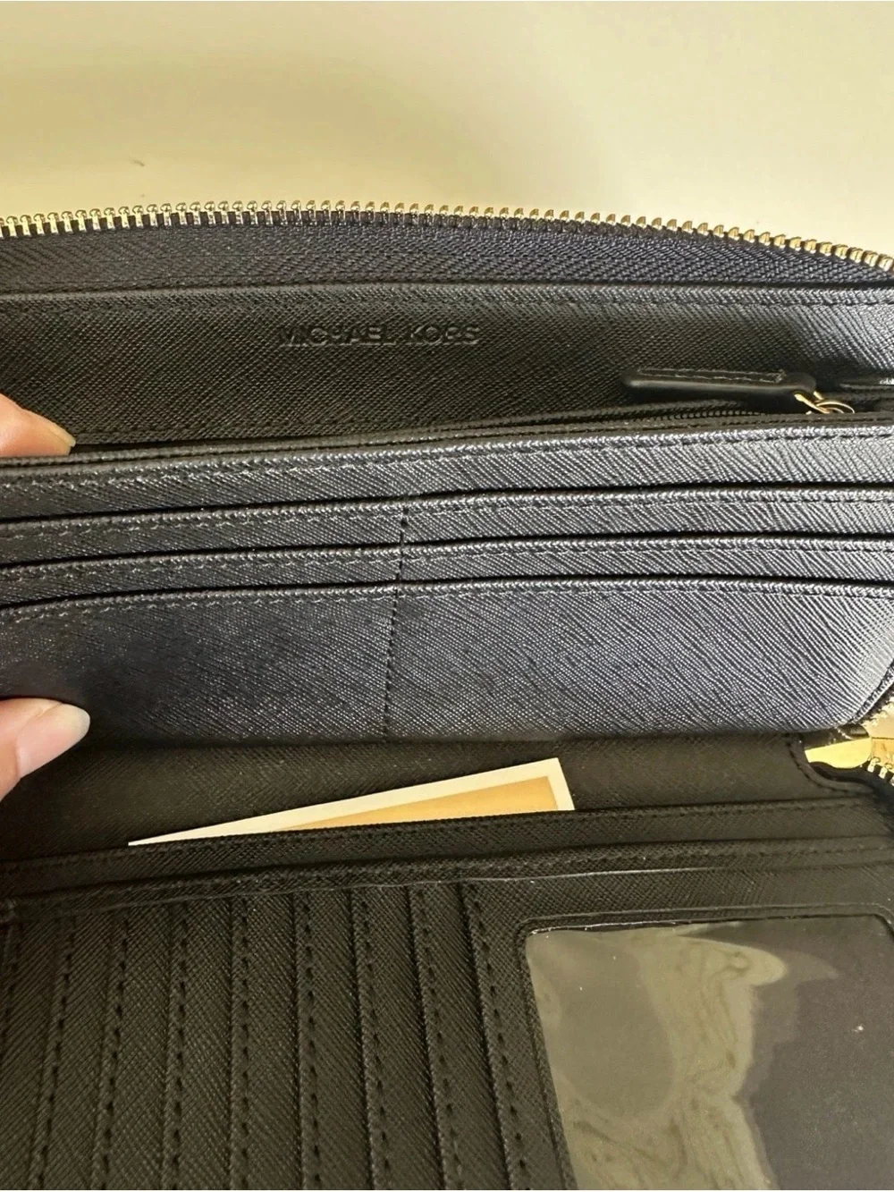 Michael Kors Black Pebbled Leather Zip Wallet with Gold Tone Zipper Pull